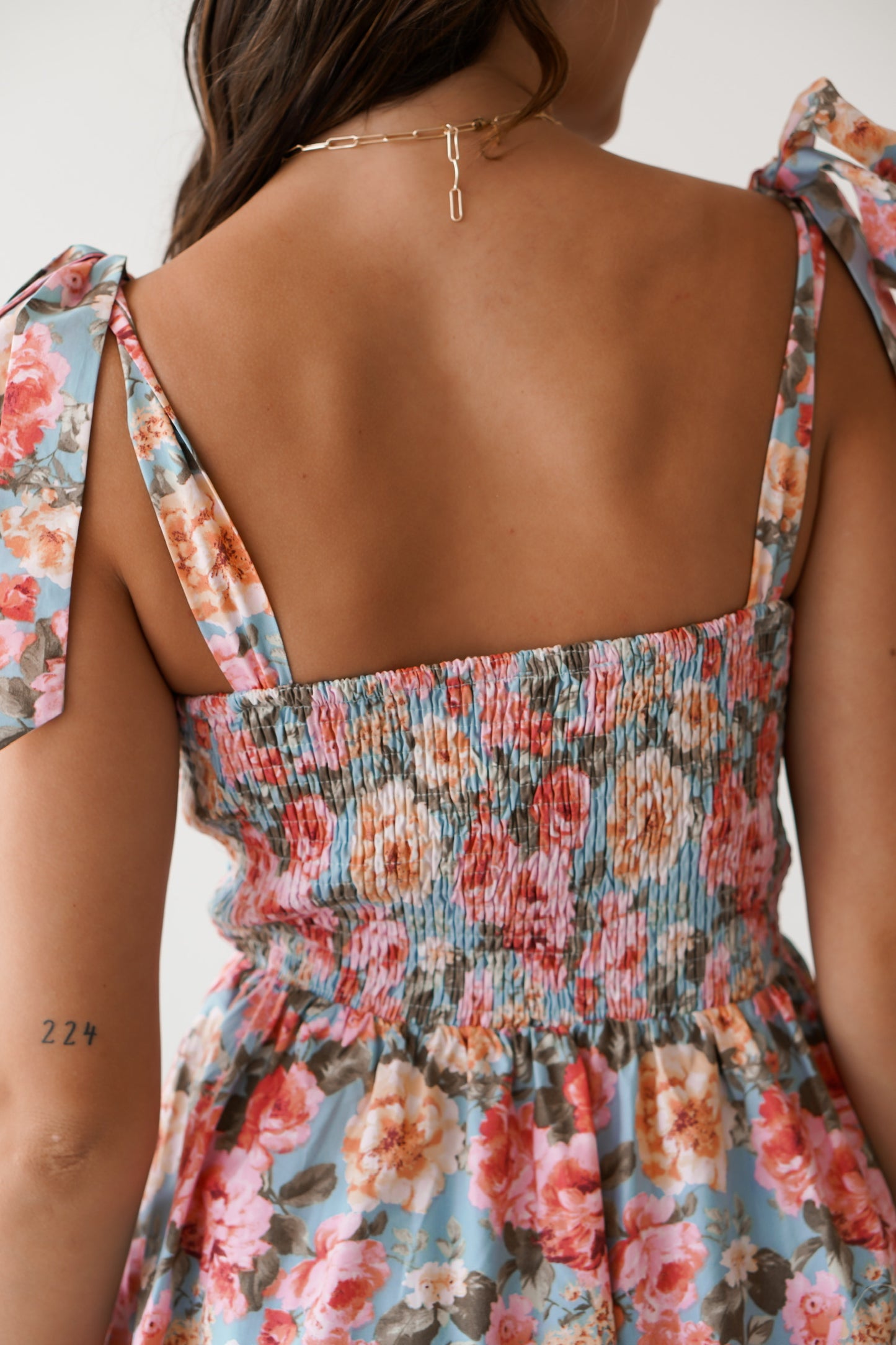 Showing an up close of the back and the smocking