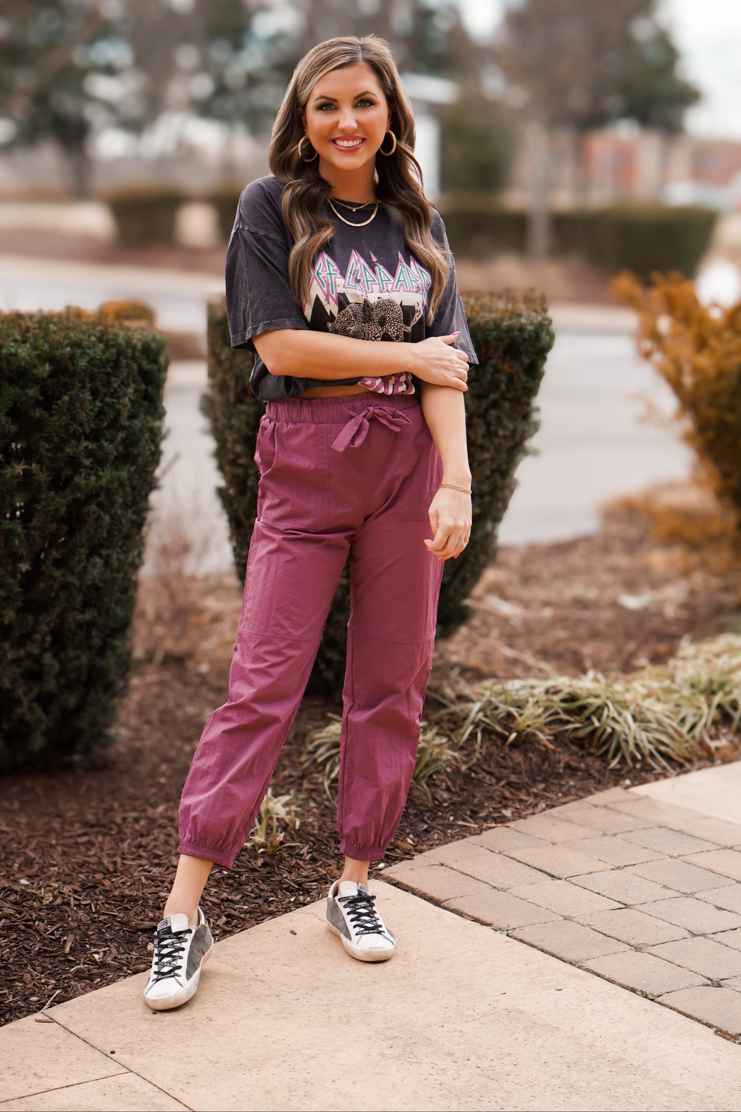 girl wearing paper bag detail joggers with graphic tee