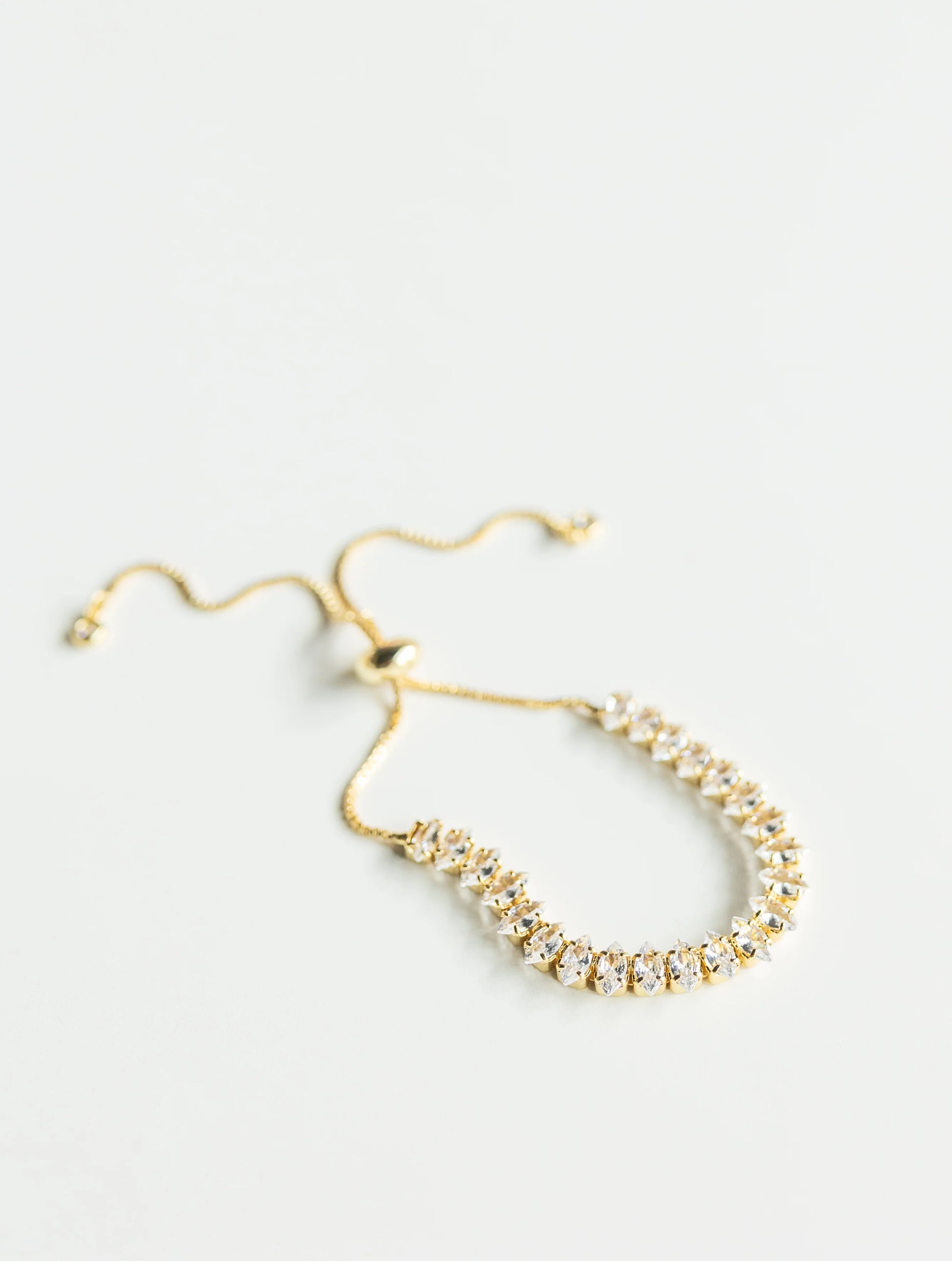 adjustable stacking bracelet on white background 